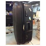 Delsey Hard-Shell Rolling Suitcase. Approx. 33