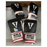 2 Sets of Title Boxing Gloves in Like New