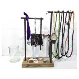Jewelry display stand with contents. Prayer bead