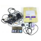 Super Nintendo console w/adapters & game