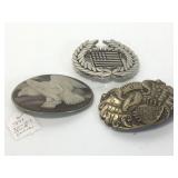 3 belt buckles. One is genuine incolay stone