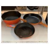 Le Greuset Cast Iron Pans and Skillet.