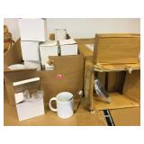 NIb metal tongs and unbranded coffee mugs.
