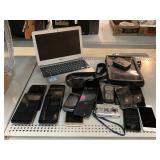 Samsung tablet, digital camera, assorted phones