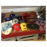 Sports hats, balls, wrestling helmet and more