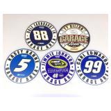 5 NASCAR round 12in wall signs. Assorted