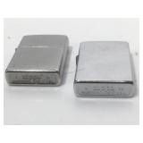 2 Zippo flip top lighters.