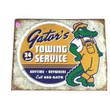 Metal sign. Gators Towing service
