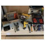 Tools. Ax, hammer, saw, flashlights, screwdrivers