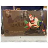 Chenille Santa in Airplane. 48 inches in Box.