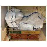 Box of assorted dust protective liners. Dress