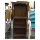 Wood small bookshelf w/3 shelves, glass panel on