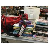 Books. Assorted. Nike duffle bag.
