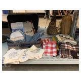 Vintage linens, throw blankets and more.