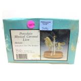 Sealed in box. Prettique musical carousel lion.