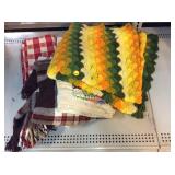 Assorted blankets.