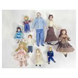 Small bisque family dolls.