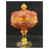 Amber glass footed candy dish with lid.