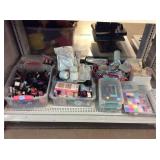 Assorted nail supplies, crafting supplies, and