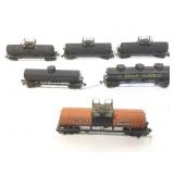 Model train tanker cars.