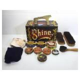 Portable shoe shine box with contents. Brushes