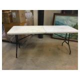Folding white table 29x72in Folding white table 29x72in