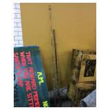 4 Fishing rods w/1 reel, largest one is 7ft tall 4 Fishing rods w/1 reel, largest one is 7ft tall