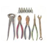 Snips, wrench and more. Assorted hand tools.