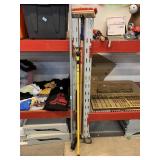 Assorted tools. Lightbulb reacher, power wash