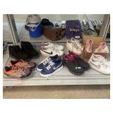 Assorted shoes. Nike, Vans, Lugz, and wolverine.