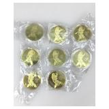 8 risquï¿½ novelty token coins. Cased and bagged