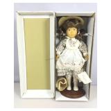 Handcrafted Penny Camelot Wooden doll with stand.