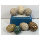 Marble eggs and small Pyrex dish.