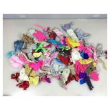 Vintage Barbie doll clothes and more.