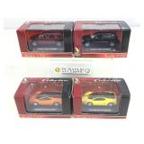 4 die cast metal collector cars. 1:72 scale. In