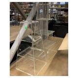 2 plexiglass display stands. Multi shelf.