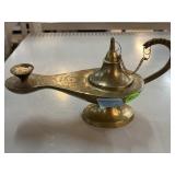 Brass genie oil lamp. Approx 8.5 in