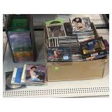 Assorted CDs and storage container.