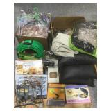 Rolled waterworks hose, drapes and linens,