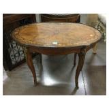 Vtg Oval table w/brass edge and wood inlay,