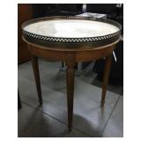 Vtg round table w/stone top, and metal edge,