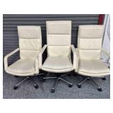 3 High back office chairs with beige cushions