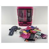 Barbie doll in carry case & clothing