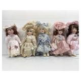 Porcelain dolls w/stands 9 in tall