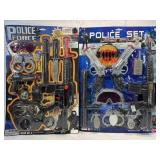 2 police officer play set packs.