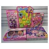 Cosmetics and jewelry play sets.