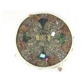 Native style craft display. Feathers on board