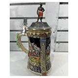 Ornate German beer stein knight topper on metal