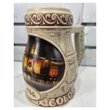Coors beer stein, 8 in tall. Chipped on bottom.