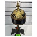 German helmet infantry NCO on wooden stand,